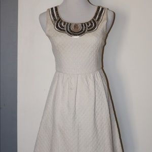 Cream and gold dress